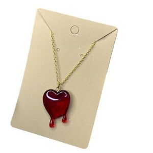 Bleeding red heart necklace